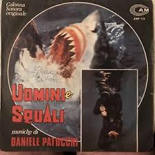 locandina del film UOMINI E SQUALI
